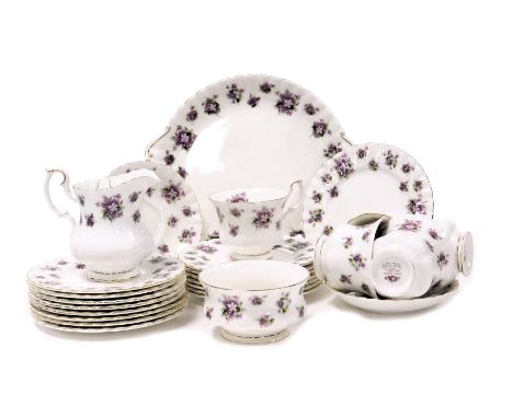 A Royal Albert porcelain Sweet Violets pattern part tea service, comprising bread plate, cream jug, sugar bowl, five tea cups