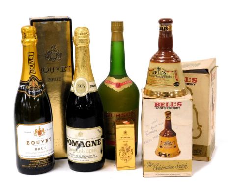 A bottle of Bouvet Brut, 75cl, boxed, bottle of Lourson Napoleon brandy, two Bells scotch whisky decanters, boxed, bottle of 