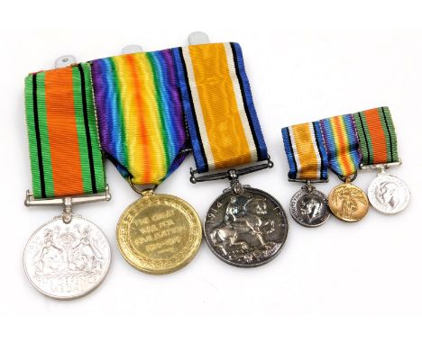 A WWI and WWII medal group, comprising 1914-18 British War Medal, Victory Medal and 1939-45 Defence Medal, the WWI medals ins