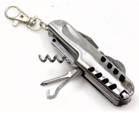 A Swiss stainless steel army knife, with twelve blades and other tools.