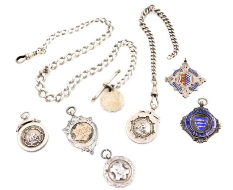 Two various silver curb link watch chains, and various crested fobs, comprising a partially curb link chain with clip, 17cm l