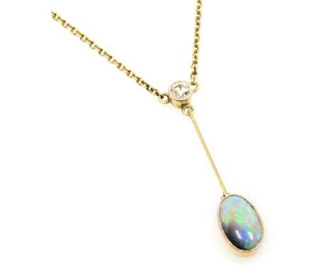 An Edwardian fire opal and diamond drop pendant, set in yellow metal, stamped 15ct, on a neck chain, with bolt ring clasp, di