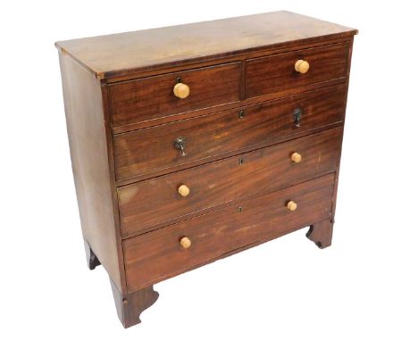 A late Georgian mahogany chest, of two short over three long graduated drawers, raised on bracket feet, 103cm high, 107cm wid