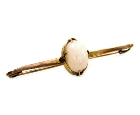 An Edwardian opal set bar brooch, in yellow metal, cased. 