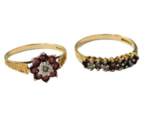A 9ct gold and amethyst five stone ring, set with pairs of diamonds at intervals, size N/O, together with a 9ct gold ruby and