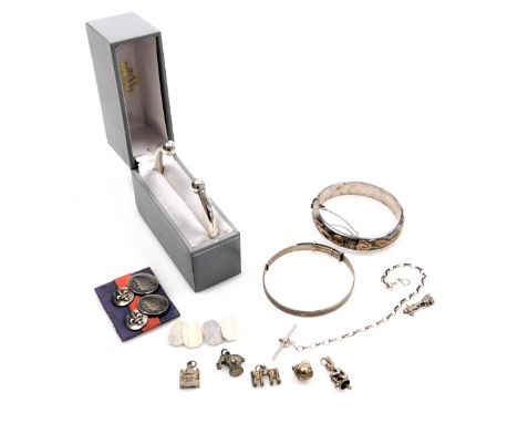 A silver torc bangle, two silver hinged bangles, part silver watch chain, pair of silver cufflinks, 110.8g all in, a pair of 