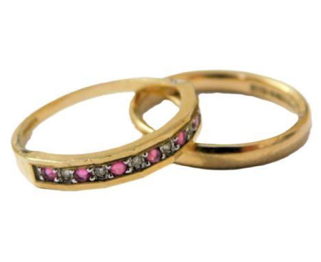A 9ct gold ruby and diamond half hoop eternity ring, size N, together with a 9ct gold wedding band, size N, 3.8g. 