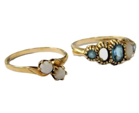 A 9ct gold and opal two stone ring, in a crossover design, size N, and a 9ct gold, aquamarine and opal five stone ring, one o