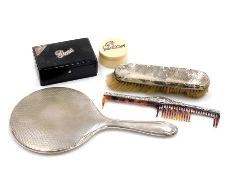 A group of dressing table items, comprising a silver backed brush, silver pot and tortoiseshell comb, silver plated hand mirr