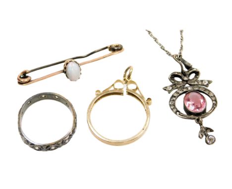 A 9ct gold pendant coin mount, 1.4g, an opal set bar brooch, in yellow metal, 2.2g, a Victorian paste set pendant on later ch