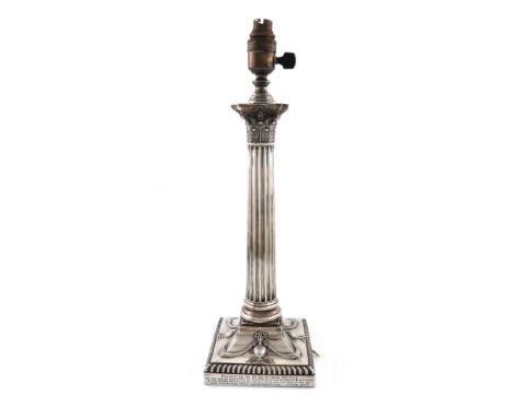 An Edwardian silver lamp stand, by J. B. Carrington, London 1904, Corinthian Column form, drilled for electricity, on a raise