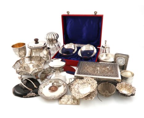 λA mixed lot of silver items, comprising: a Victorian silver-mounted glass inkwell, London 1884, a silver and tortoiseshell w