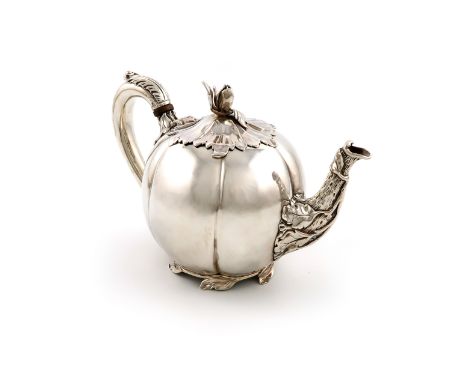 A William IV silver teapot, by Paul Storr, London 1831, also stamped 'STORR  &amp; MORTIMER', melon form, leaf capped scroll 