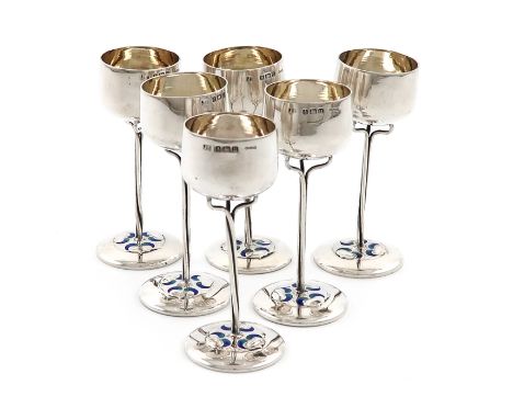 A set of six silver Art Nouveau tot cups, by James Fenton &amp; Co, Birmingham 1919, also with import marks for 1911, circula