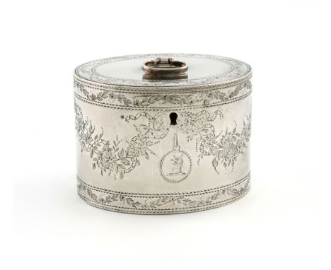 A George III silver tea caddy, Robert Makepeace &amp; Richard Carter, London 1777, oval form, the flush-hinged cover with an 