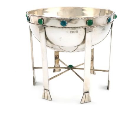 By A. E. Bonner, an Edwardian Arts and Crafts silver centre-piece, London 1907, circular form, spot-hammered decoration, set 