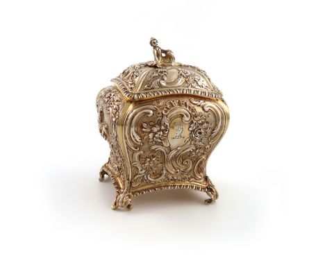 An electro-gilded tea caddy, circa 1900, rounded rectangular bombé form, with Rococo figures and foliate scroll decoration on