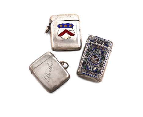 A Norwegian silver and enamel vesta case, rectangular form, with vari-coloured foliate decoration, blue and white borders, pl