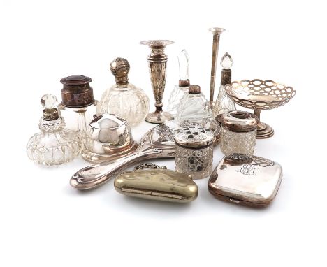 A mixed lot of silver items, various dates and makers, comprising: a silver travelling clock, London 1915, rounded rectangula