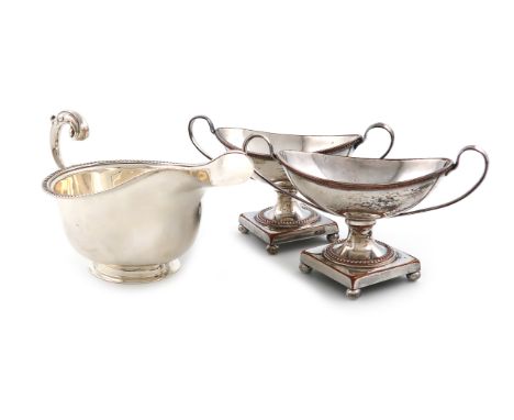 A silver sauce boat, by S. Blanckensee and Sons, Birmingham 1933, oval form, gadroon border, scroll handle, on an oval foot, 