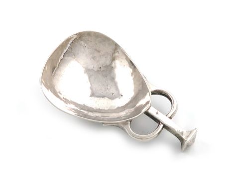 By A. E. Jones, an Arts and Crafts silver caddy spoon, Birmingham 1920, fig-shaped bowl, spot-hammered decoration, with a squ