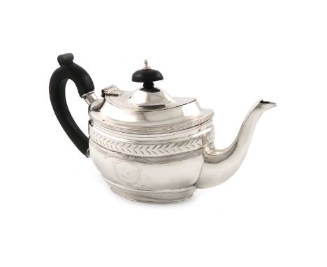 An Edwardian silver bachelor's teapot, by Nathan and Hayes, Chester 1904, oval form, scroll handle, engraved decoration, leng