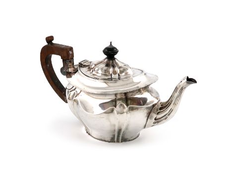 A late-Victorian silver teapot, by Robert Pringle, London 1900, lobed oval form, scroll handle, domed hinged cover, length ha