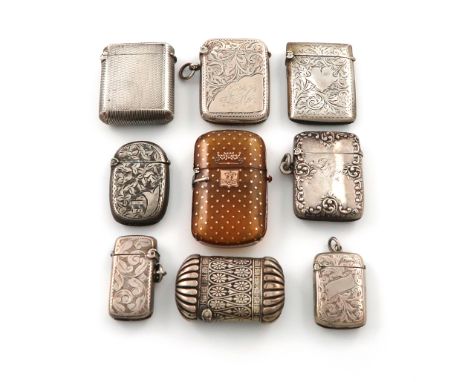 λA mixed lot of silver vesta cases, various dates and makers, comprising: one with chased foliate decoration, one engine-turn