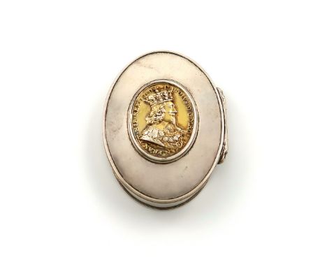 An early 18th century silver snuff box, unmarked circa 1720, oval form, the hinged cover set with an oval silver-gilt medalli