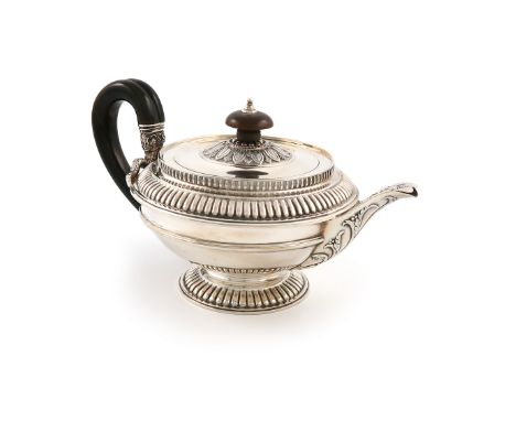 A late-Victorian silver teapot, by Charles Stuart Harris, London 1900, circular form, fluted decoration, horn scroll handle a