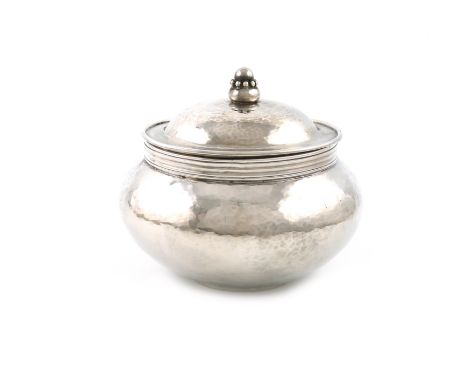 By Philip Frederick Alexander, an Arts and Crafts silver bowl and cover, London 1913, circular form, spot-hammered decoration