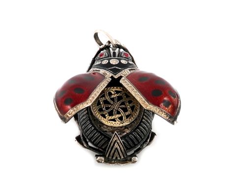 A rare silver and enamel ladybird vinaigrette, unmarked circa 1900, with sprung red and black enamelled wings, which open to 