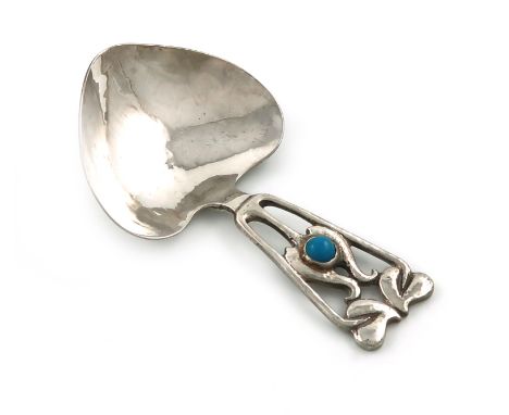 By A .E. Jones, an Edwardian silver Art Nouveau caddy spoon, Birmingham 1909, heart-shaped bowl, the handle with pierced Art 