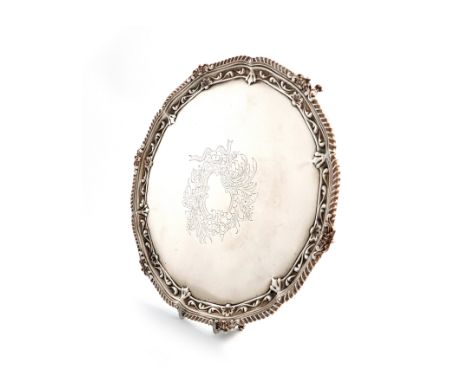 A Victorian silver salver, by Edward Hutton, London 1891, circular form, gadroon and foliate border, the centre with a vacant