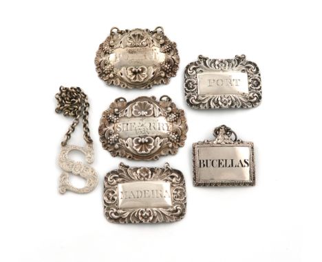 A collection of silver wine labels, comprising: a pair of rectangular form, foliate borders, maker's mark of T.W, incised 'PO