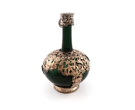 A 17th century Dutch silver-mounted green glass shaft and globe bottle, probably by Hans C. Brechtel, The Hague 1664, the mou