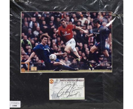 ROY KEANE OF MANCHESTER UNITED F.C., SIGNED DISPLAY mounted with photograph of him playing against Sunderland and a signed ti