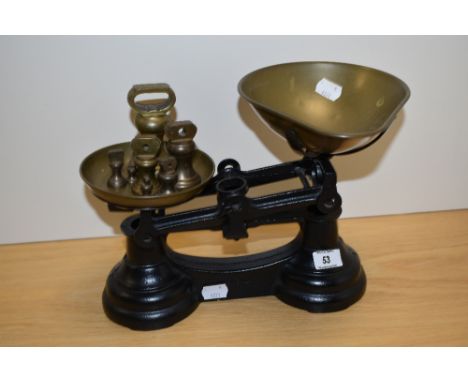 A set of late 19th Century/early 20th Century scales with weights
