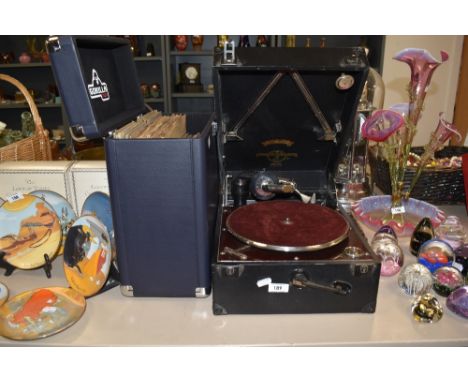 An early 20th century Viva-tonal Columbia grafanola wind up gramophone and a case of shellac records.