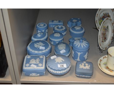 Fourteen Wedgwood Jasper ware trinket boxes.