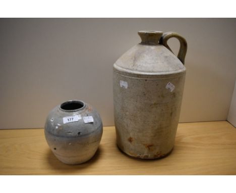 A large vintage stoneware flagon and a primitive glazed stoneware vase, AF.