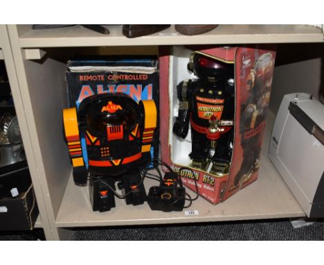 Two 1980s toy robots, union electric remote controlled alien one and new bright No1175 Robotron RT-2, the walking robot, both