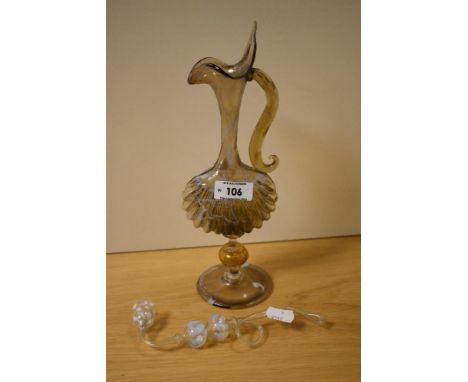 A Venetian Murano glass ewer, amber glass with trailed blue glass decoration, most likely by Salviati &amp; Company, having s