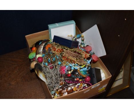 An assortment of modern and vintage costume jewellery, including necklaces, beads, earrings etc.