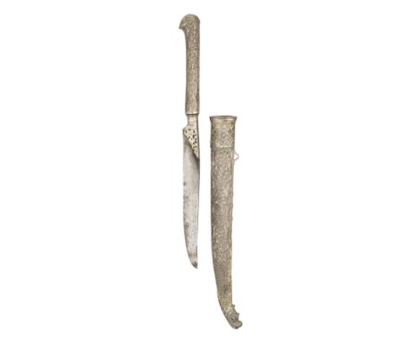 with slightly curved single-edged blade, silver hilt embossed and chased with traditional scrollwork, flowers and foliage, in