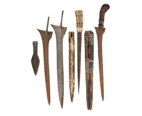 the first five with pattern welded double-edged blade, one retaining its carved grip and an associated scabbard; the dagger w