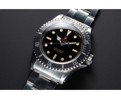 A VERY RARE GENTLEMAN'S STAINLESS STEEL ROLEX OYSTER PERPETUAL SUBMARINER BRACELET WATCHCIRCA 1964, REF. 5513 PCG WITH GLOSS 