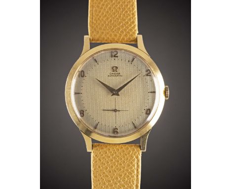 A GENTLEMAN'S LARGE SIZE 18K SOLID ROSE GOLD OMEGA AUTOMATIC WRIST WATCHCIRCA 1952, WITH TWO TONE HONEYCOMB DIALMovement: 17J