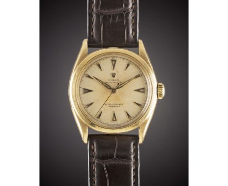 A GENTLEMAN'S 18K SOLID YELLOW GOLD ROLEX OYSTER PERPETUAL WRIST WATCHCIRCA 1952, REF. 6084 WITH "OCC" DIALMovement: Automati