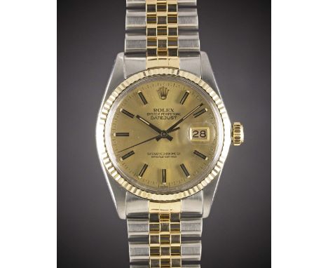 A GENTLEMAN'S STEEL & GOLD ROLEX OYSTER PERPETUAL DATEJUST BRACELET WATCHCIRCA 1982, REF. 16013 WITH CHAMPAGNE DIALMovement: 